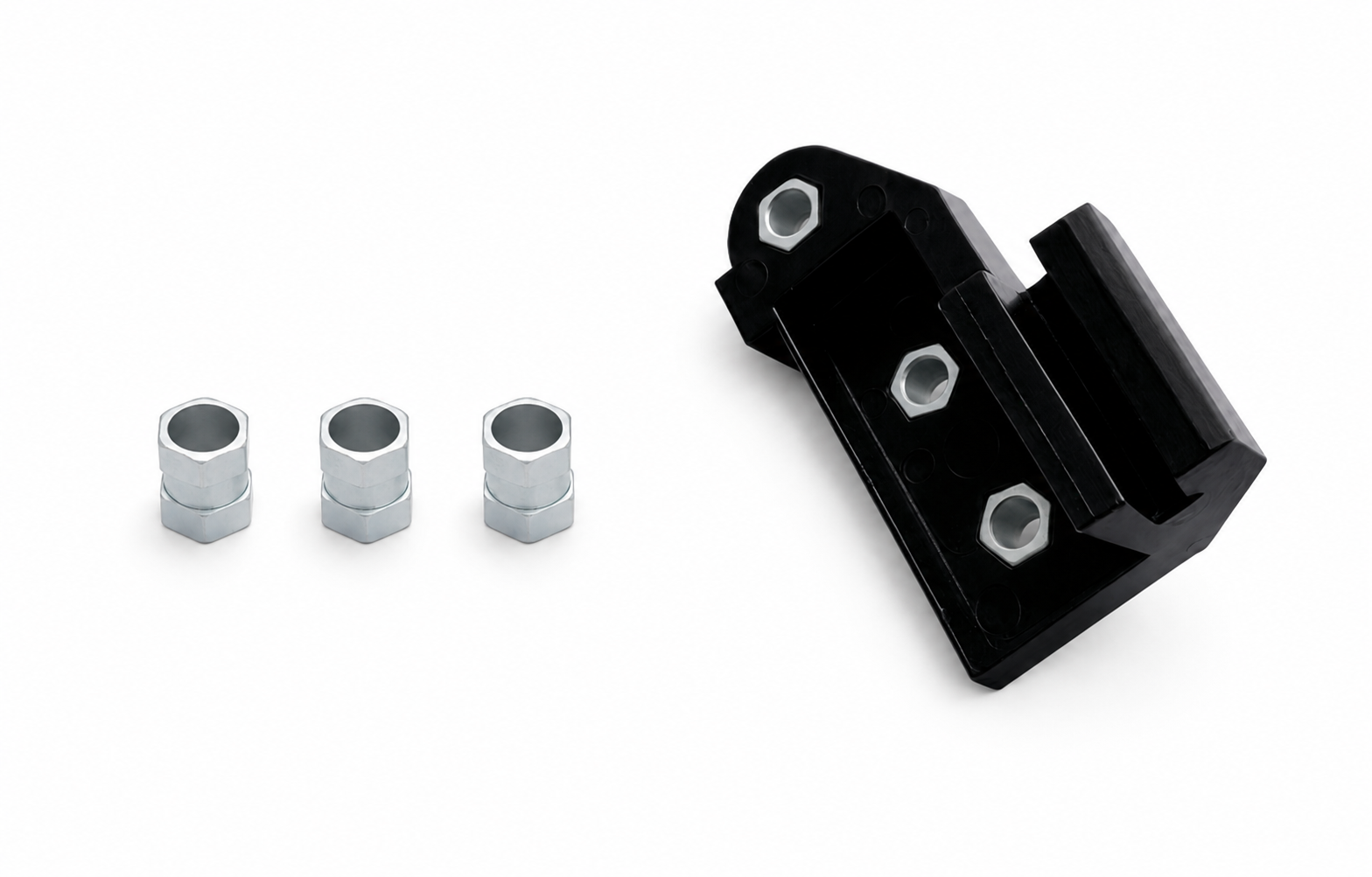 Bracket body with three plain-bore inserts before final assembly