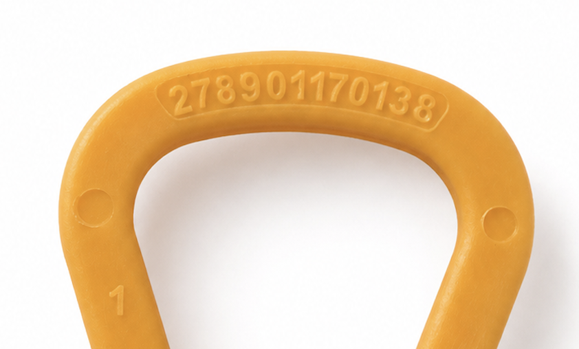 Part number moulded across the top of a finished orange handle