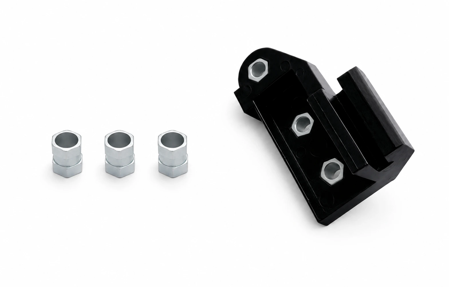 Nylon 66 bracket with three plain-bore metal inserts